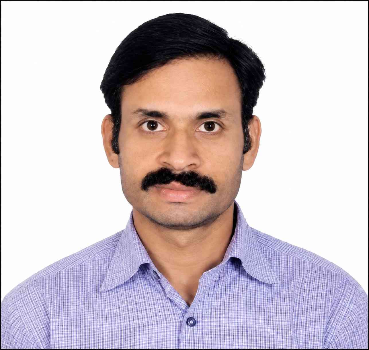 Dr. Abhay Tambe