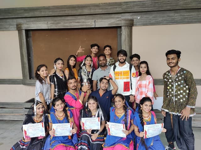 CDGI Cultural Group holding the first prize trophy in Nodal Level Dance Competition.