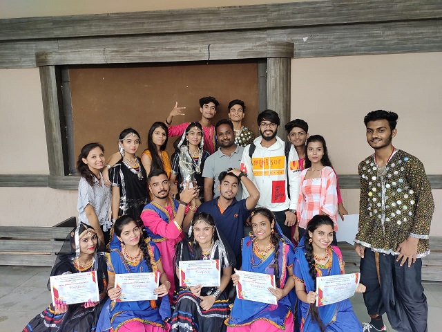 CDGI Cultural Group holding the first prize trophy in Nodal Level Dance Competition.